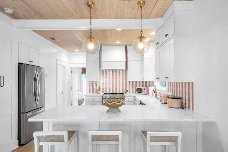 Fully Stocked Kitchen features island seating for 3