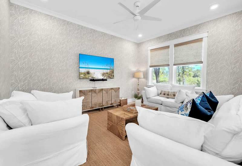 Plenty of seating in the living room space for the family.