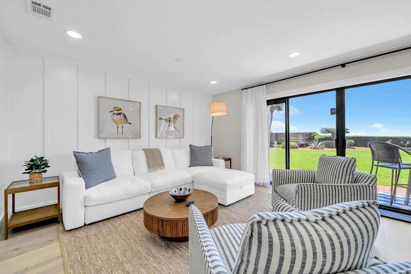Living room seating for all, with Gulf view