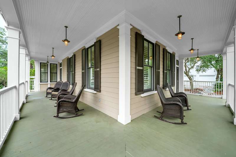 Wrap around front porch with seating