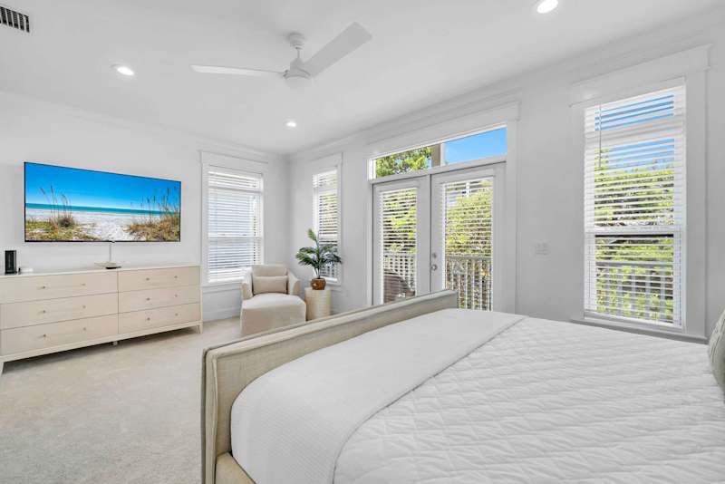 Room features smart tv and porch access