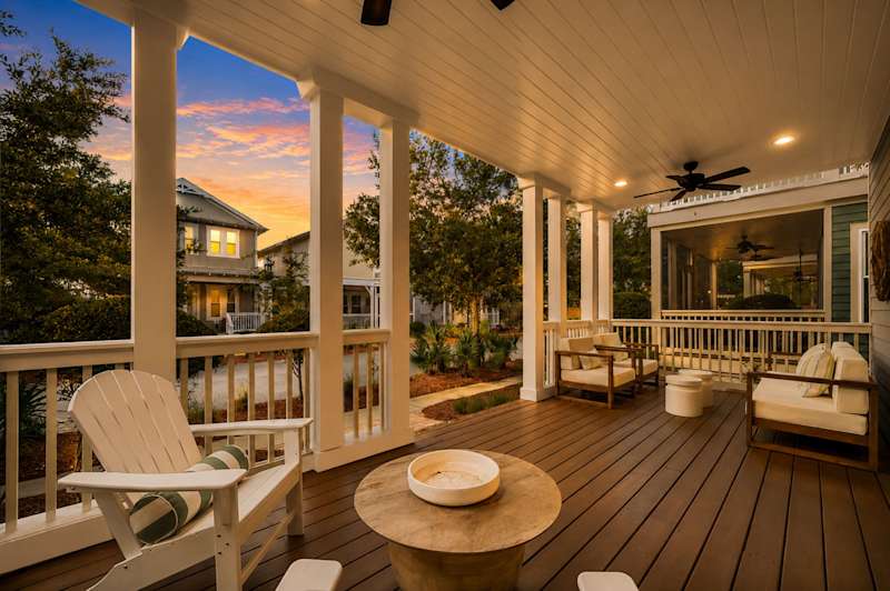 Enjoy mornings on the private covered porch with outdoor seating!
