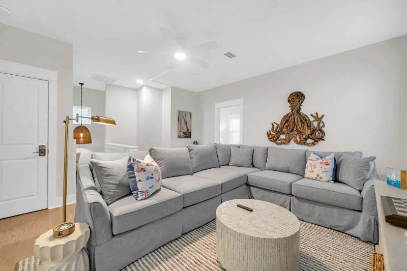 Second floor living space with sleeper sofa and smart tv