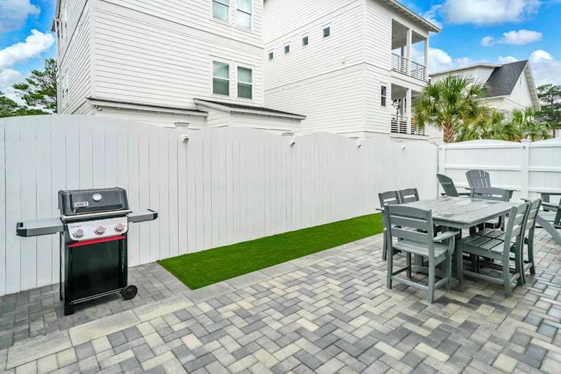 Private fenced in yard with gas grill & outdoor seating