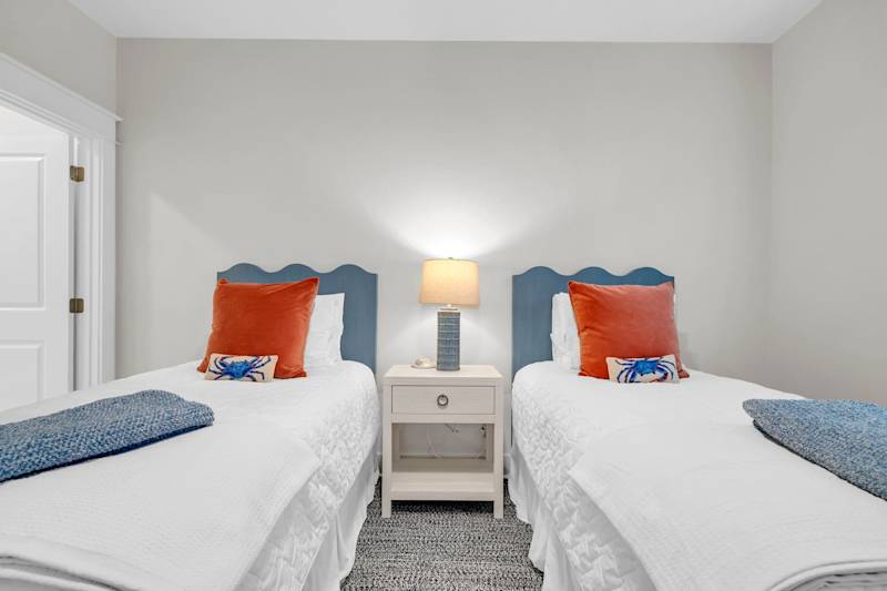 Home features a bedroom with two twin beds perfect for the kids or extra guest! 