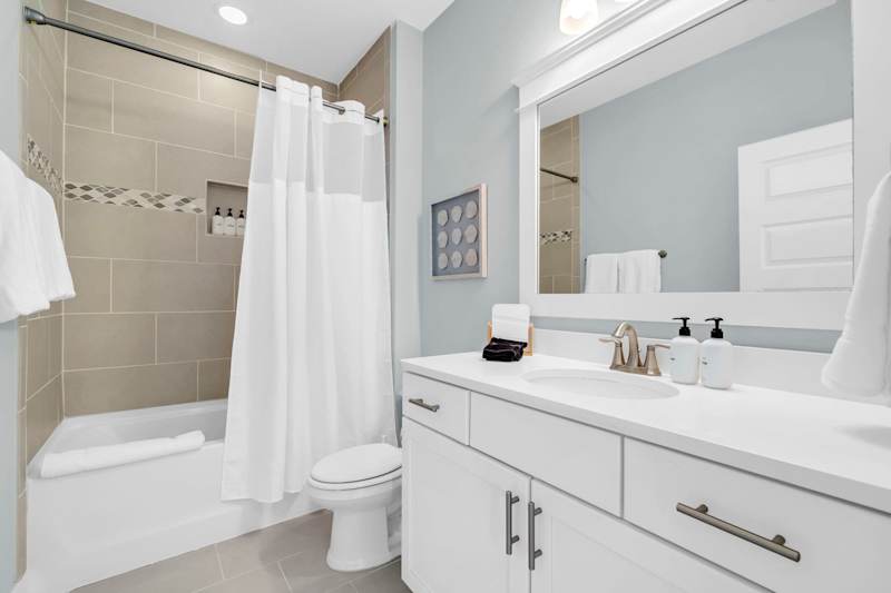 Second floor hall bathroom, features shower/tub combo