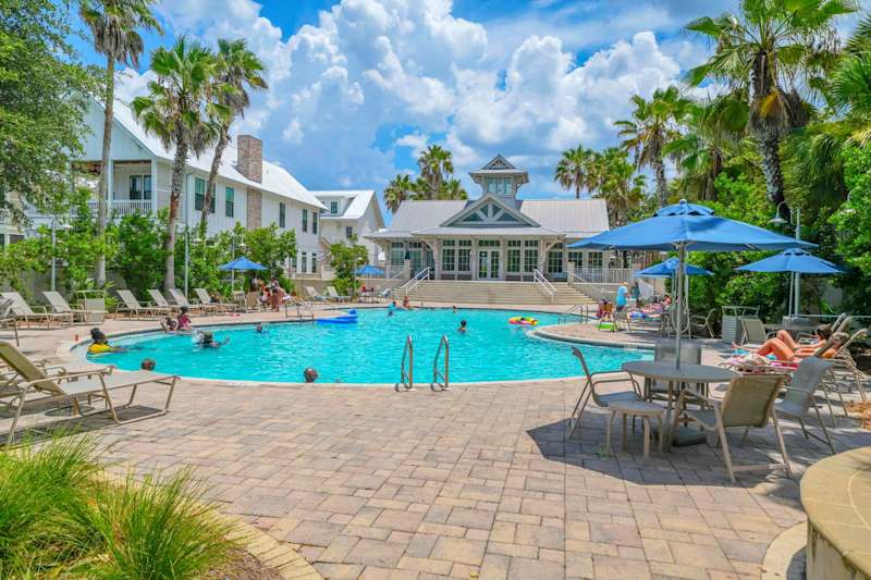 Community pool is steps from the home! 
