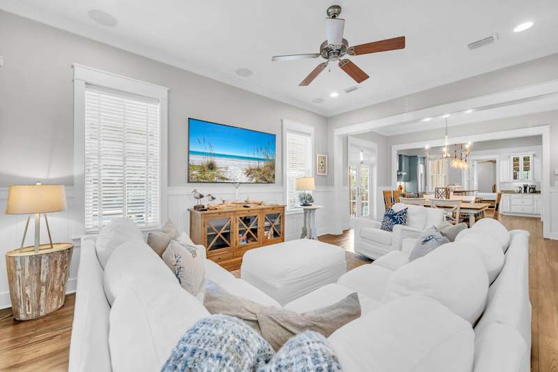 Living room with smart tv and seating for all