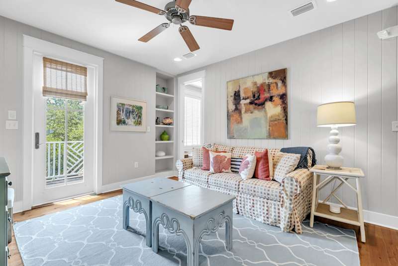Second floor living space features a sleeper sofa