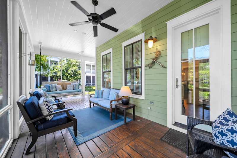 Covered porch features seating