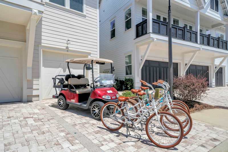 4 seater golf cart & 4 adult bikes included in your stay