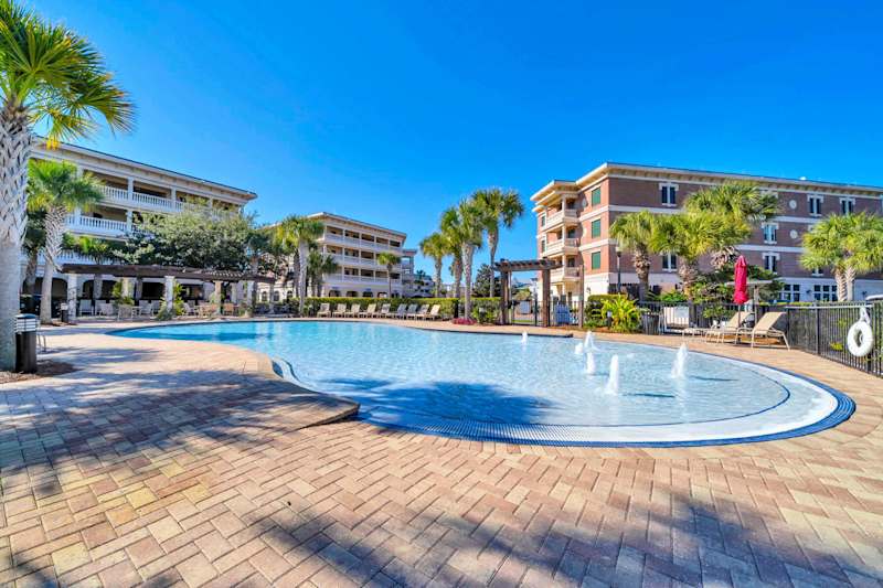 Zero-entry community pool steps outside the condo! Heated during cooler months.