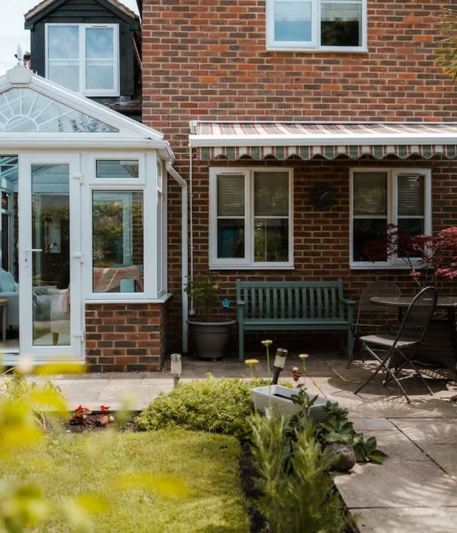 The back garden and conservatory of our Headcorn house