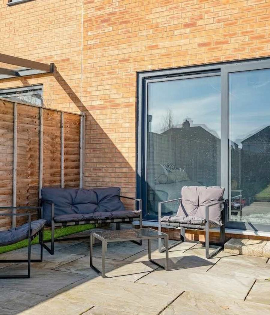 The back garden and patio at our Swindon house