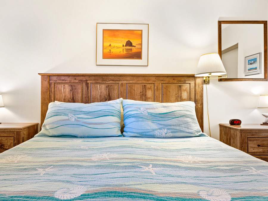 Bedroom with king bed in Unit 01 at Hi-Tide Resort