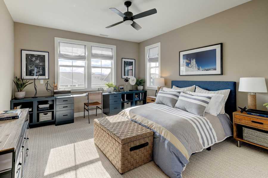 The king bedroom is a primary suite with a plush bed and cozy seating.