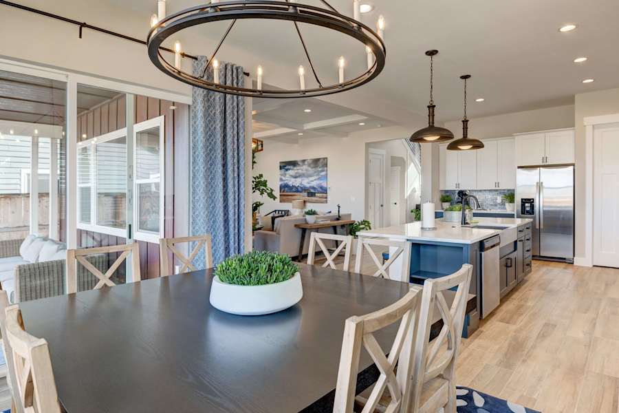 The kitchen has stainless steel appliances and chic cabinetry.