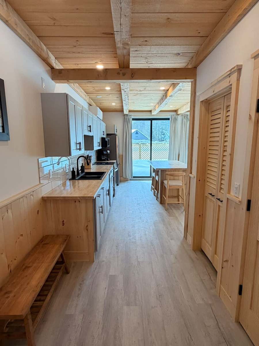 The kitchen, with an island and bar stool seating.