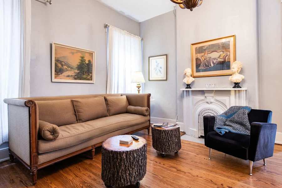 The living room, with comfortable seating and warm decor.