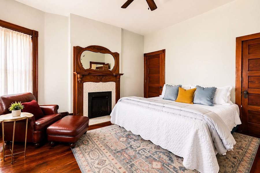 Bedroom 1, with a king bed and a dresser.