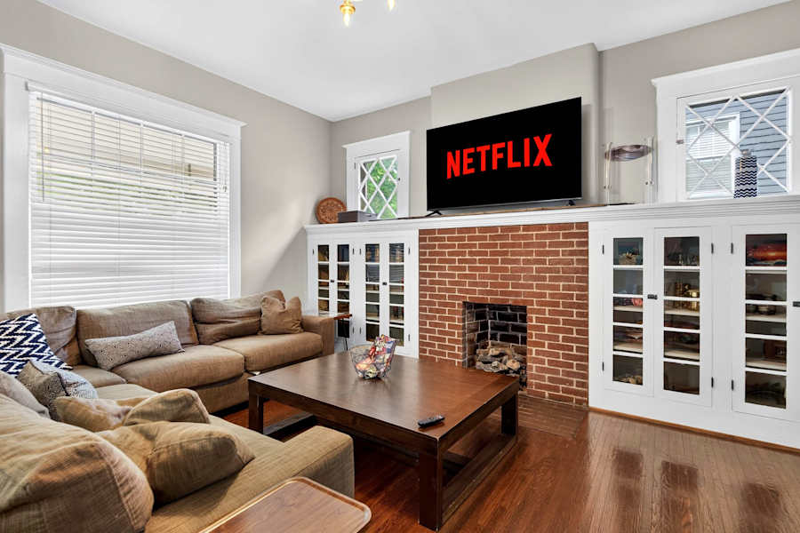 The living room, with a smart TV and comfortable seating.