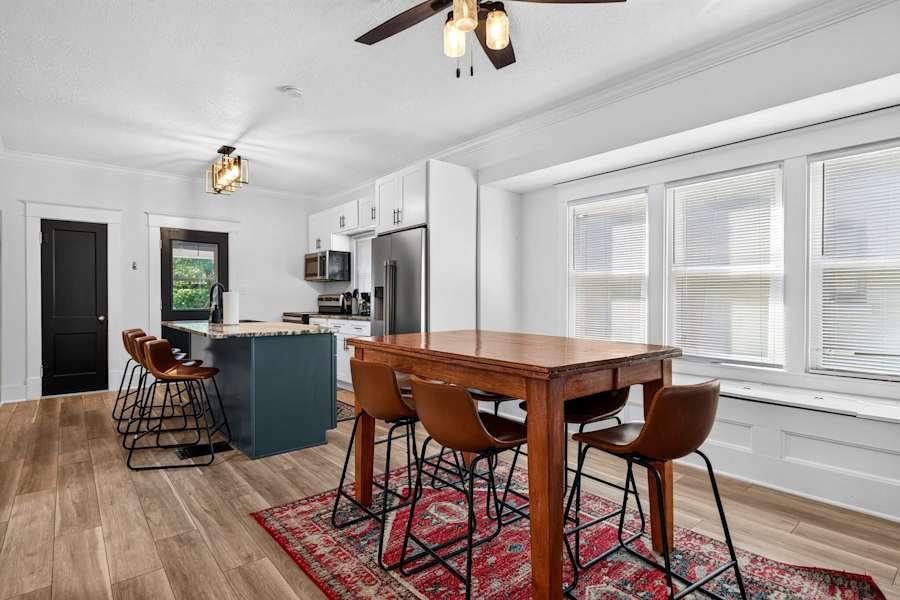 The kitchen and dining table, set up for family meals.