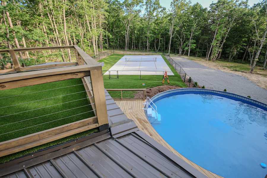 Outdoor communal pool, pickleball court, & rooftop deck