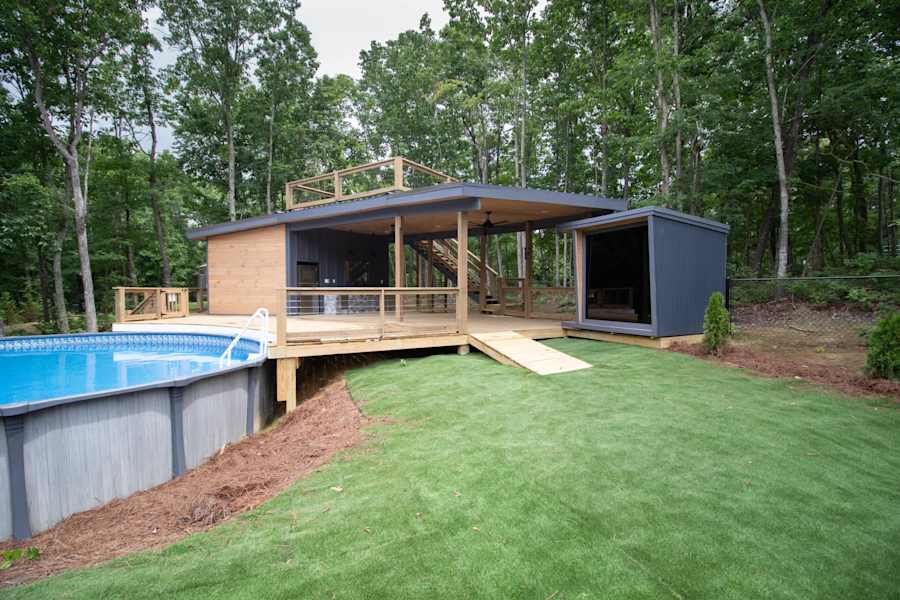 Outdoor communal pool, sauna, outdoor kitchen, & rooftop deck