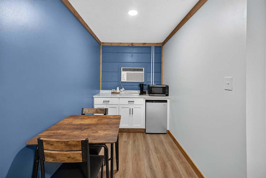 Kitchenette with a table and chairs