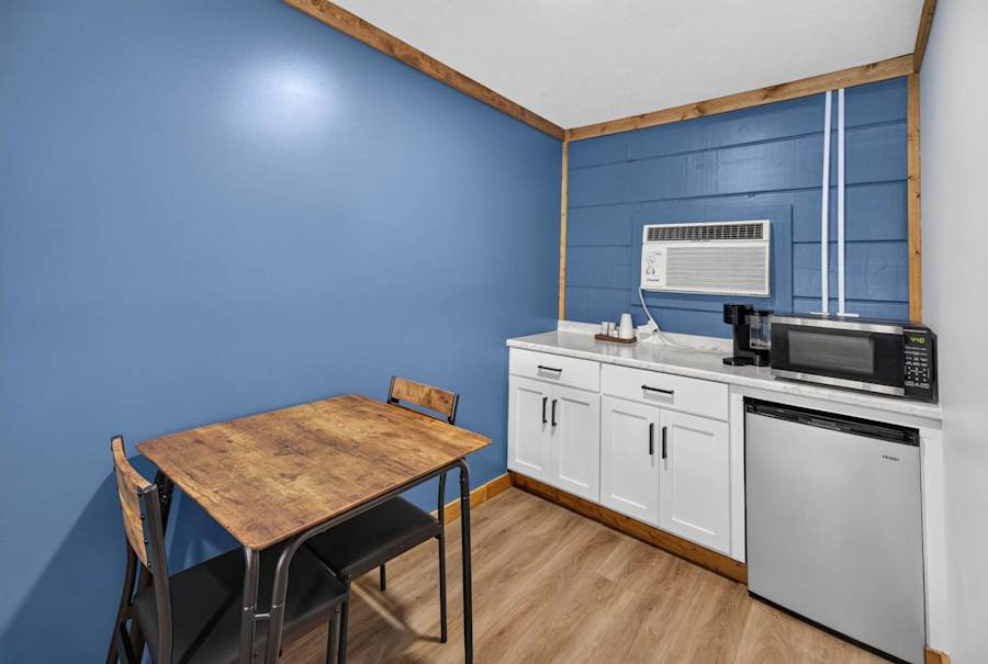 Kitchenette with a table and chairs