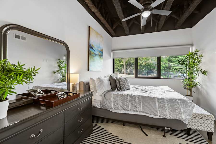 The bedroom, with soft bedding and a calm feel.