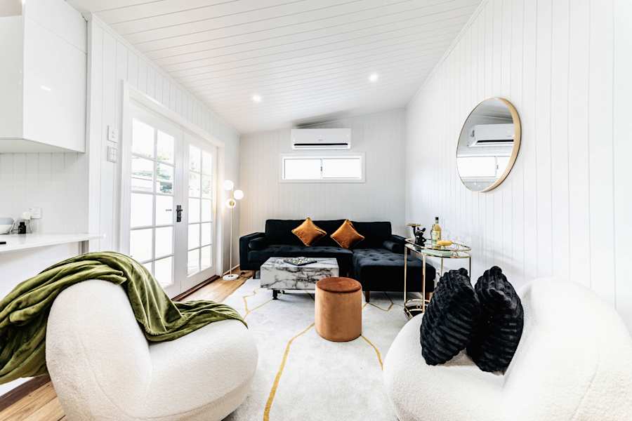 Bright styled living room at the W Cottage, West Ipswich