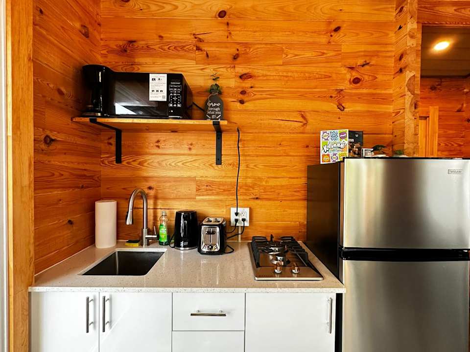 1-Bedroom Unique Eco Log Cabin #101 at Mill Lake Unique Cabins — photograph 5