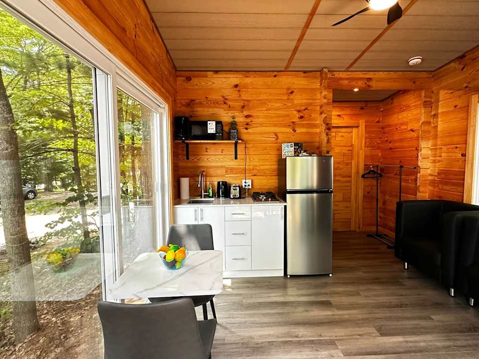 1-Bedroom Unique Eco Log Cabin #106 at Mill Lake Unique Cabins — photograph 3