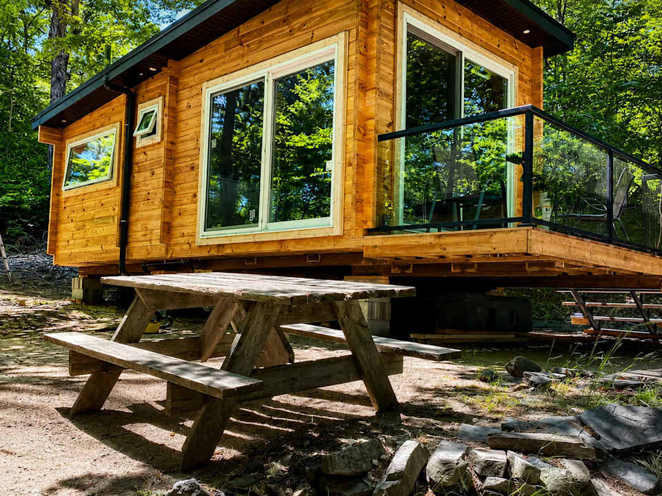 1-Bedroom Unique Eco Log Cabin #104 at Mill Lake Unique Cabins — photograph 1