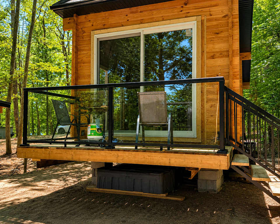 1-Bedroom Unique Eco Log Cabin #102 at Mill Lake Unique Cabins — photograph 1